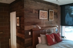Wall clad in reclaimed lumber 2